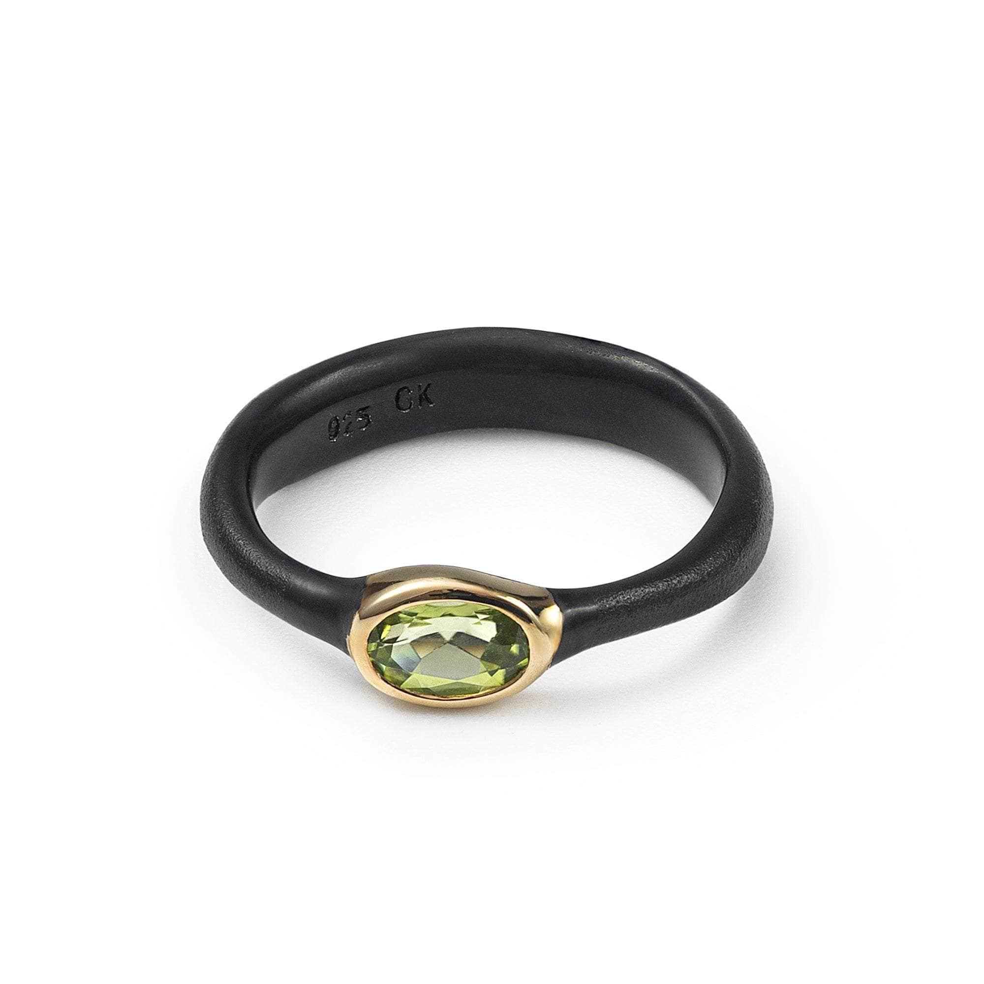 German Kabirski Afor Peridot Ring